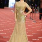 Cuándo: 2012. Qué: Blumarine. Por qué: por la combinación del vestido dorado con detalles glitter y transparencias con un peinado trenzado ligeramente desaliñado.