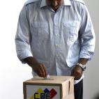 Venezuela's interim President Nicolas Maduro places his ballot in a box during the presidential election in Caracas, Venezuela, Sunday, April 14, 2013. Voters were deciding Sunday whether to elect Maduro, who served as late President Hugo Chavez...