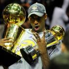 Kobe Bryant of the Los Angeles Lakers celebrates victory following Game 5 of the NBA Finals against the Orlando Magic at Amway Arena on June 14, 2009 in Orlando, Florida. The Lakers won the National Basketball Association championships defeating...