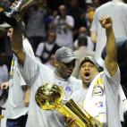 Kobe Bryant (L) and Derek Fisher celebrate after defeating the Orlando Magic in Game 5 of the NBA finals at Amway Arena on June 14, 2009 in Orlando, Florida. The Lakers won the National Basketball Association championships defeating Orlando 99-8...