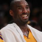 LOS ANGELES, CA - DECEMBER 29: Kobe Bryant #24 of the Los Angeles Lakers smiles from the bench against the New York Knicks at Staples Center on December 29, 2011 in Los Angeles, California. NOTE TO USER: User expressly acknowledges and agrees t...