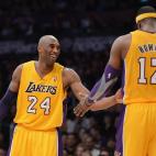 LOS ANGELES, CA - DECEMBER 28: Kobe Bryant #24 of the Los Angeles Lakers jokes with Dwight Howard #12 during the game against the Portland Trail Blazers at Staples Center on December 28, 2012 in Los Angeles, California. The Lakers won 104-87. ...