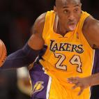 Kobe Bryant of the Los Angeles Lakers drives against the Portland Trail Blazers during their NBA game on December 28, 2012 at Staples Center in Los Angeles, California. AFP PHOTO / Joe KLAMAR (Photo credit should read JOE KLAMAR/AFP via G...