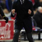 Barcelona's coach Josep Guardiola reacts after a goal by his team during the Spanish League football match between Atletico de Madrid and Barcelona at the Vicente Calderon stadium in Madrid on February 26, 2012. AFP PHOTO/JAVIER SORIANO (Photo...
