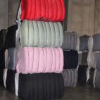 Tejidos listos para confeccionar prendas de ropa.