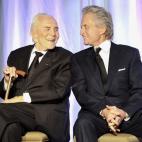 Junto a su hijo Michael en un evento benéfico