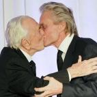 Junto a su hijo Michael en un evento benéfico