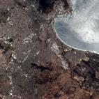 "Cape Town, South Africa, the glinting sun highlighting the water."