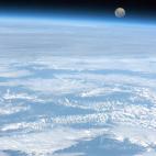 "Tonight's Finale: The full moon rises over the only planet we have ever called home."