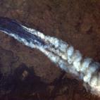 This photo, taken by Astronaut Chris Hadfield from the International Space Station, Tuesday Jan. 8, 2013 shows a view of the wildfire near Burrinjuck Dam in Australia. Look closely and you can see the flames from orbit. (AP Photo/NASA, Chris Had...