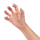 "Arid fingers of sand-blasted rock look like they're barely holding on against the hot Saharan wind."