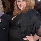 Se hizo famosa desfilando para Jean Paul Gaultier en 2007 en París. Ha creado su propia revista VOL•UP•2 y hace campaña para promover cambios en el mundo de la moda.