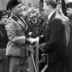 A picture taken on June 14, 1934 in Venice shows German Chancellor and Nazi Dictator Adolf Hitler (R) shaking hands with Italian dictator Benito Mussolini. AFP PHOTO FRANCE VOIR (Photo credit should read -/AFP/Getty Images)