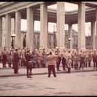 During a ceremony in remembrance of 1923 Beer Hall Putsch, German Fuhrer and Reichskanzler Adolf Hitler (1889 - 1945) (center, back to camera) shakes hands with a uniformed Nazi party member as others stand at attention in front of one of the tw...