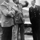 German nazi Chancellor Adolf Hitler (4th L) is seen with Admiral Miklos Horthy (2nd L), Regent of Hungary, during the launching ceremonies of the 'Prinz Eugen' cruiser in Kiel on August 22, 1938. AFP PHOTO / FRANCE PRESSE VOIR (Photo credit shou...