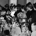 An undated and unlocated picture shows German Nazi chancellor Adolf Hitler receiving flowers from little children. AFP PHOTO / FRANCE PRESSE VOIR (Photo credit should read -/AFP/Getty Images)