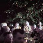 German Fuhrer and Reichskanzler (essentially Chancellor) Adolf Hitler (1889 - 1945) sits with other Nazi Party officials at a Christmas party for of Waffen SS (or Schutzstaffel) officer cadets at the Lowenbraukeller. Munich, Germany, December 18...
