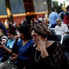 People react after an earthquake shook buildings in Mexico City, Mexico February 16, 2018. REUTERS/Edgard Garrido