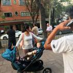 People stand on the street after an earthquake shook buildings in Mexico City, Mexico February 16, 2018. REUTERS/Claudia Daut