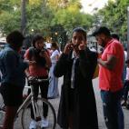 MEXICO CITY, MEXICO - FEBRUARY 17: People are seen as they wait after the city hit by powerful earthquake with 7.5 magnitude in Mexico City, Mexico on February 17, 2018. (Photo by Manuel Velasquez/Anadolu Agency/Getty Images)