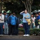 MEXICO CITY, MEXICO - FEBRUARY 17: People are seen as they wait after the city hit by powerful earthquake with 7.5 magnitude in Mexico City, Mexico on February 17, 2018. (Photo by Daniel Cardenas/Anadolu Agency/Getty Images)