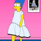 Con uno de los vestidos de la línea Victoria, de Victoria Beckham.