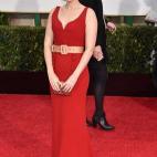 Con vestido de Miu Miu.