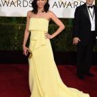 Con vestido de Carolina Herrera.