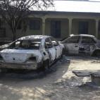 Burnt our cars are seeing at the business and skills center following gun battle and explosions by the Boko Haram sect, in Potiskum, Nigeria, Saturday, Oct. 20, 2012. (AP/Photo Adamu Adamu)