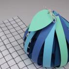 SE NECESITAN: varias cartulinas de colores, una regla, un c&uacute;ter, unas tijeras, un taladro, una pistola de silicona y un cord&oacute;n largo (+ el desayuno)Mira C&Oacute;MO HACERLO