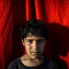 Arif, un refugiado sirio-kurdo de 10 años, posa en el campo de refugiados de Rojava, en Sanliurfa (Turquía).