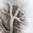 El 3 de agosto de 2015, el OLI del Landsat 8 captó esta imagen de los glaciares en el Sirmilik National Park Pond Inlet en Mittimatalik, Canadá.