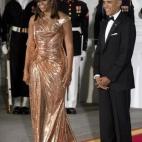 En la última cena de estado de la presidencia de Barack Obama, celebrada el 18 de octubre de 2016 en honor al primer ministro italiano Matteo Renzi y su esposa Agnese Landini, Michelle Obama vistió un vestido asimétrico en oro rosa creado esp...