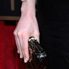 Este bolso y pulseras corresponden a la protagonista de un bastante popular show británico sobre las diferencias sociales a inicios del siglo pasado.