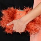 Esta latina mató a dos muppets para hacerse esta cartera...