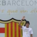 FC Barcelona's new signing Neymar gestures upon his arrival at the club's office at the Camp Nou stadium in Barcelona, Spain, Monday, June 3, 2013. Neymar arrived in Barcelona on Monday to complete his deal with the Catalan club, which will see ...