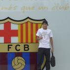 FC Barcelona's new signing Neymar gestures upon his arrival at the club's office at the Camp Nou stadium in Barcelona, Spain, Monday, June 3, 2013. Neymar arrived in Barcelona on Monday to complete his deal with the Catalan club, which will see ...