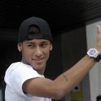 FC Barcelona's new signing Neymar gestures upon his arrival at the club's office at the Camp Nou stadium in Barcelona, Spain, Monday, June 3, 2013. Neymar arrived in Barcelona on Monday to complete his deal with the Catalan club, which will see ...