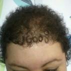 This woman was "overcome with feelings of joy and serenity" when she noticed the word "God" spelled in her post-chemo curls. Click here to read the whole story.