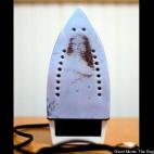 A Massachusetts woman said she saw this image of Jesus Christ on the bottom of her iron on Nov. 27. Mary Jo Coady, who had recently separated from her husband and suffered economic hardship, said the image has reassured her that "life is going t...