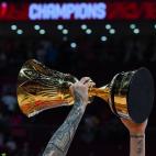 Spain's Juan Hernangomez celebrates with their winning trophy at the end of the Basketball World Cup final game between Argentina and Spain in Beijing on September 15, 2019. (Photo by Greg BAKER / AFP) (Photo credit should read GREG BAKER...