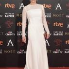 De Lorenzo Caprile, con clutch rosa de Salvatore Ferragamo