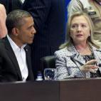 President Barack Obama and then-Secretary of State Hillary Clinton attend a Plenary Session for the VI Americas Summit at the Julio Cesar Turbay Ayala Convention Center in Cartagena, Colombia, April 14, 2012. (SAUL LOEB/AFP/Getty Images)