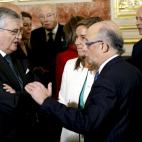 Eduardo Torres-Dulce, junto a Ana Mato y Cristóbal Montoro.