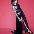 A su llegada a la proyección de la película La Fille Inconnue (La chica desconocida).