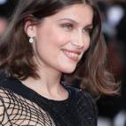 A su llegada a la proyección de la película La Fille Inconnue (La chica desconocida).