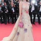 A su llegada a la proyección de la película La Fille Inconnue (La chica desconocida).