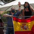 MADRID, SPAIN - MAY 23: Supporters of Far right wing VOX party, holding Spanish flags take part on an in-vehicle protest against the Spanish government's struggle policy against the novel coronavirus (Covid-19) pandemic on May 23, 2020 in Madrid...