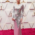 Con vestido de lentejuelas de Michael Kors.