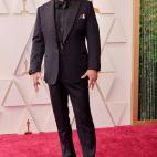 Con esmoquin de Saville Row.